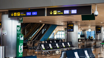Equipment and lounge at Madrid's international airport in Spain where airplanes are waiting to...