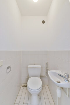 Interior of bathroom with toilet and sink