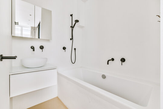 Modern bathroom with sink and bathtub