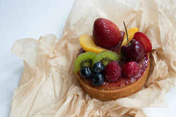 Close up Danish Fruit Tart on white background