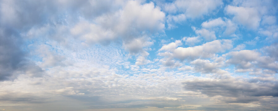 Bright colored idyllic cloudy sky to the horizon at sunny day