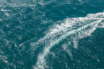 Fototapeta premium View from the top of the sea surface. Blue sea water background texture