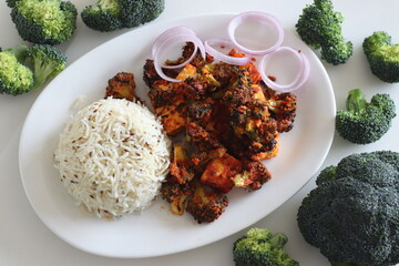 Tandoori paneer broccoli. Cottage cheese cubes and broccoli florets marinated with yogurt and...