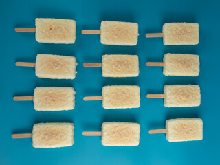 Orange ice cream with white milk chocolate.