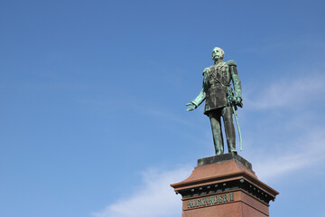 Fototapeta na wymiar The Grand duke of Finland Alexander II (1818-1881) statue by Johannes Takanen and Walter Runeberg, raised 1894, located at the Senate square in Helsinkki.