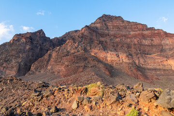 Scenic view on the massive sharp cliffs and mountain Cueva de Cabras in the La Mercia mountain range in Valle Gran Rey, La Gomera, Canary Islands, Spain, Europe. Summit in the Garajonay national park