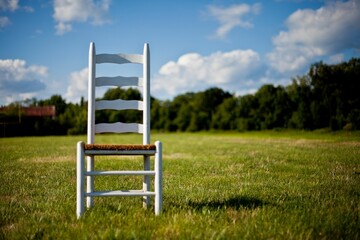 Closeup of a wooden chair isolated on a green loan