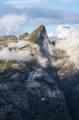 Mountain peak Poncione d'Alnasca and clouds in Ticino.