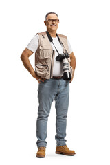 Fototapeta premium Full length portrait of a mature male photographer with a camera on a strap around neck