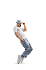 Guy dancing and holding his cap