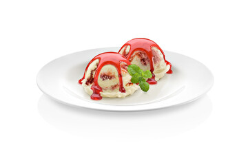 Two delicious chocolate chip ice cream scoops on a plate, with strawberry syrup on top, isolated on white