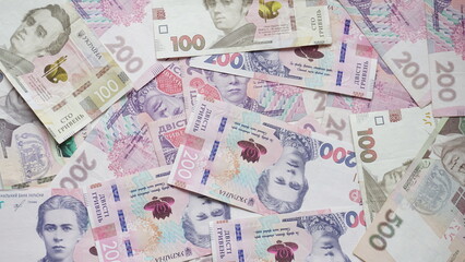 Fototapeta na wymiar Ukrainian paper money in denominations of one hundred, two hundred, five hundred hryvnias