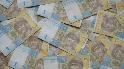A lot of Ukrainian money in the form of one paper Ukrainian hryvnia