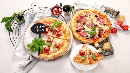 Freshly baked pizza on dark background.