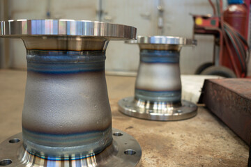 Flanges welded to the cone