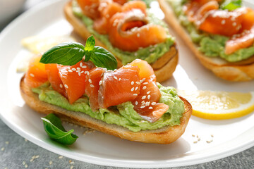 Toasts with salted salmon and avocado guacamole