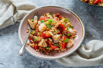 Cod, chorizo and orzo pasta with roasted red peppers