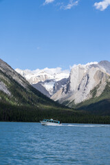 Boat on Maligne Lake, home of the famous Spirit Island, in Jasper National Park