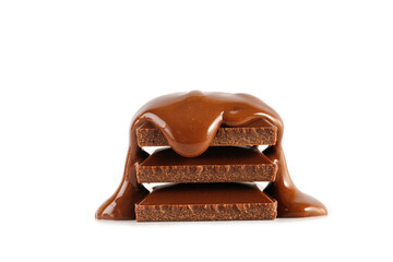 Obraz premium Stack of chocolate bars with liquid melted chocolate isolated on a white background.