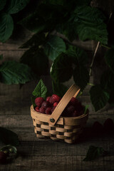 photo still life food photo raspberries in a basket