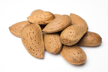 almonds in the peel isolated on a white