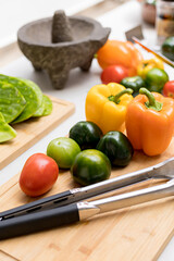 Ingredients to prepare hot sauce on a table