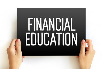 Financial Education - ability to manage personal finance effectively, text concept on card