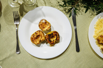 Plates of ready meals on a decorated table