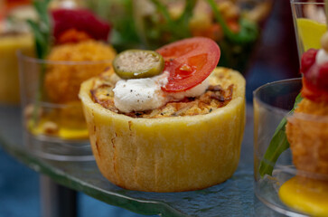 appetizer in tartlets with capers and tomato