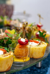 snack in a cup on the buffet close-up