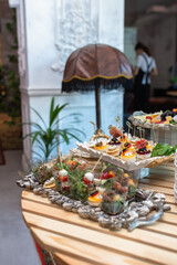 various snacks and drinks on the table at the event