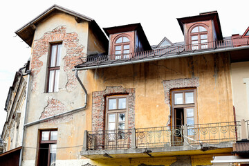 ZAKOPANE, POLAND - SEPTEMBER 13, 2022: A very old house by the Krupowki street in Zakopane, Poland.
