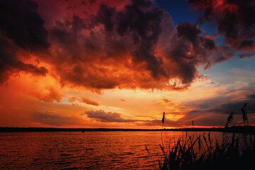 Sunset over the lake with reflection