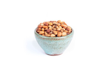 Red Cowpeas or Chori Dried Beans in Green Pottery Bowl Isolated on White