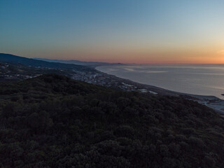 Aerial view of Jijel coastline Algeria, landscape of mountains, sunset and clouds with beautiful sky, nature of Algeria in North Africa, Maghreb, plains and grass in mountain, Mediterranean sea climat