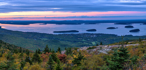 Sunset Bar Harbor - A panoramic overview of Bar Harbor and its islands at Frenchman Bay on a colorful Autumn evening, as seen from Cadillac Mountain of Acadia National Park. Maine, USA.