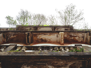 Bottom view of an abandoned ancient building. Abandoned house with rusty smudges.