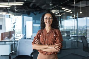 Young successful Indian IT developer female engineer working inside the office of a development...