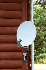 Satellite dish on outer wall
