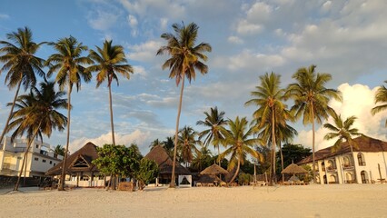 Naklejka na ściany i meble Paradise beach during the sunrise. Zanzibar. Africa.
