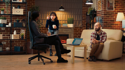 Unhappy wife complaining about marriage problems, talking about conflict with husband to...