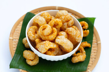 Crispy pork rinds or pork snack.