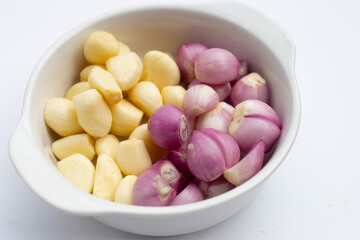 Fresh garlic with shallot on white background