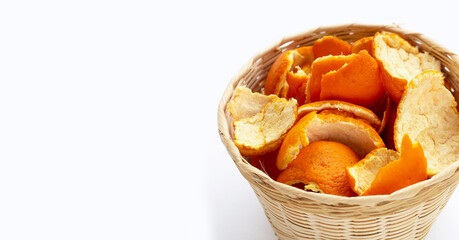 Orange peels on white background.