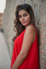 Naklejka premium Pretty young model poses in the streets of Toledo, Spain