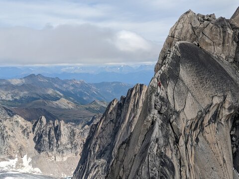 Climbers near summit of rocky peak in Bugaboos Provincial Park