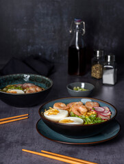 Food photography of ramen soup, noodles, prawn, egg
