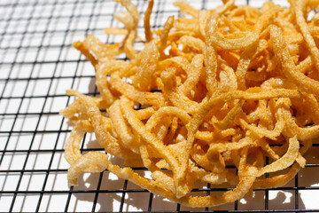 Crispy pork rinds or pork snack.