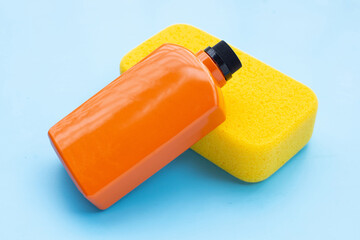Car wash and wax bottle with yellow sponge