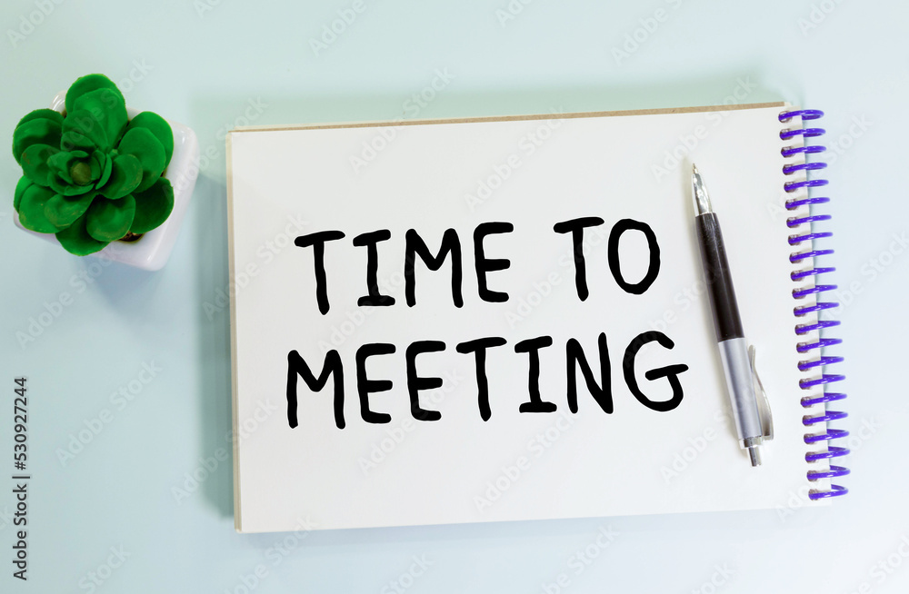 Poster minutes of the meeting text on a paper on the colorful paper background